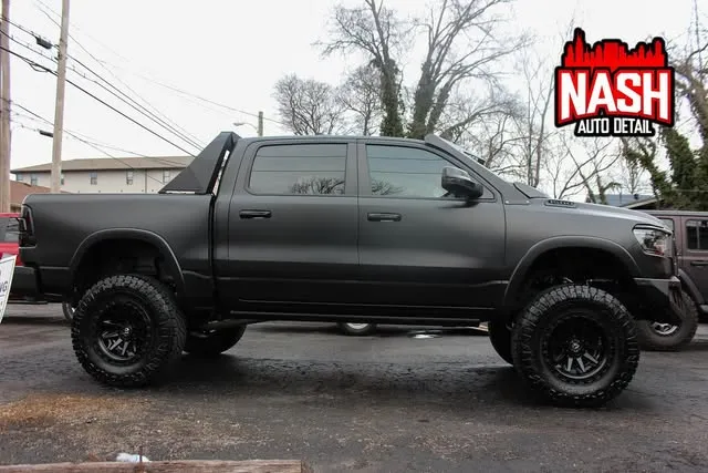 Blacked-out Ram pickup with window tint