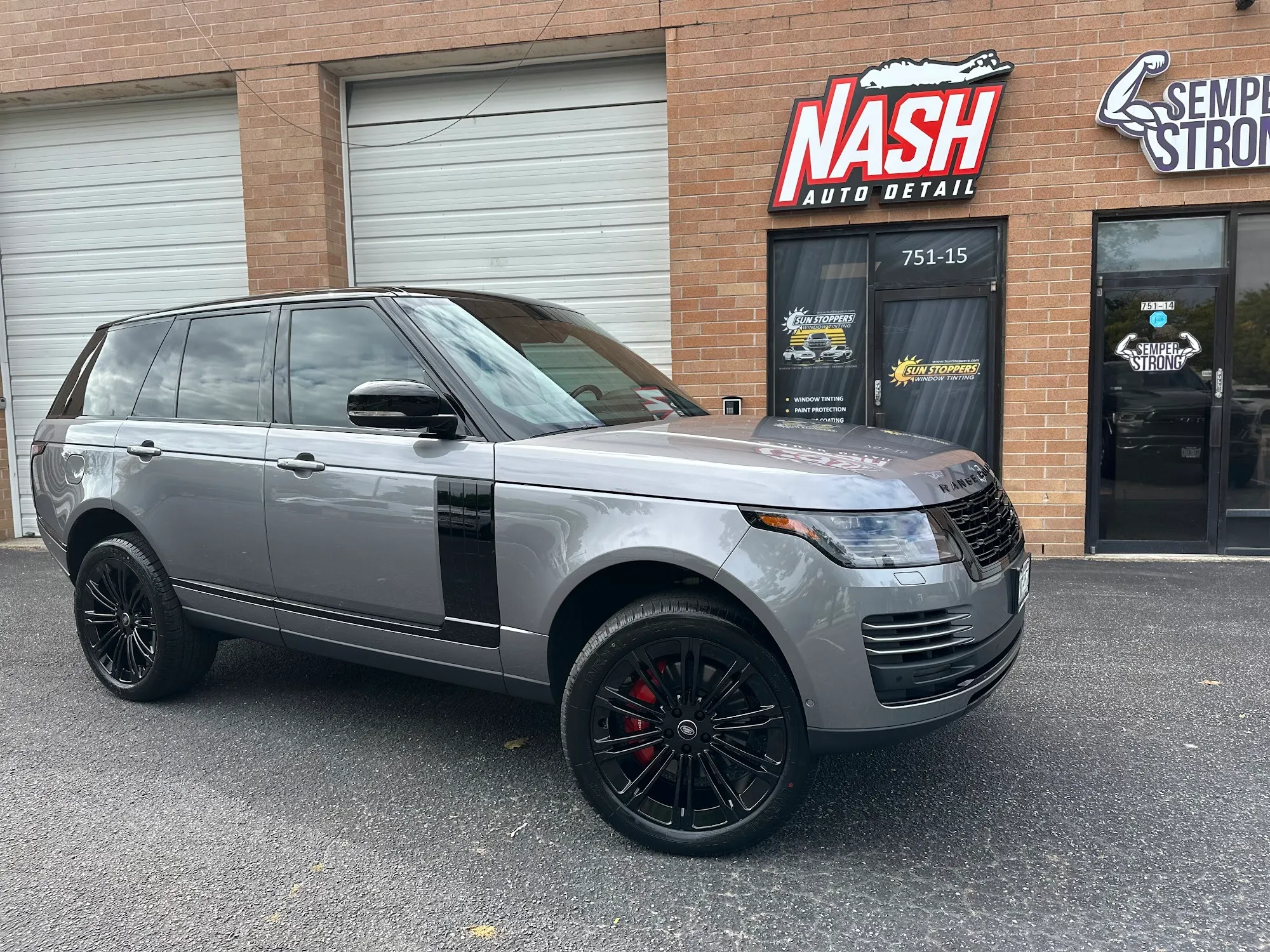 Satin grey Range Rover outside the Nash shop